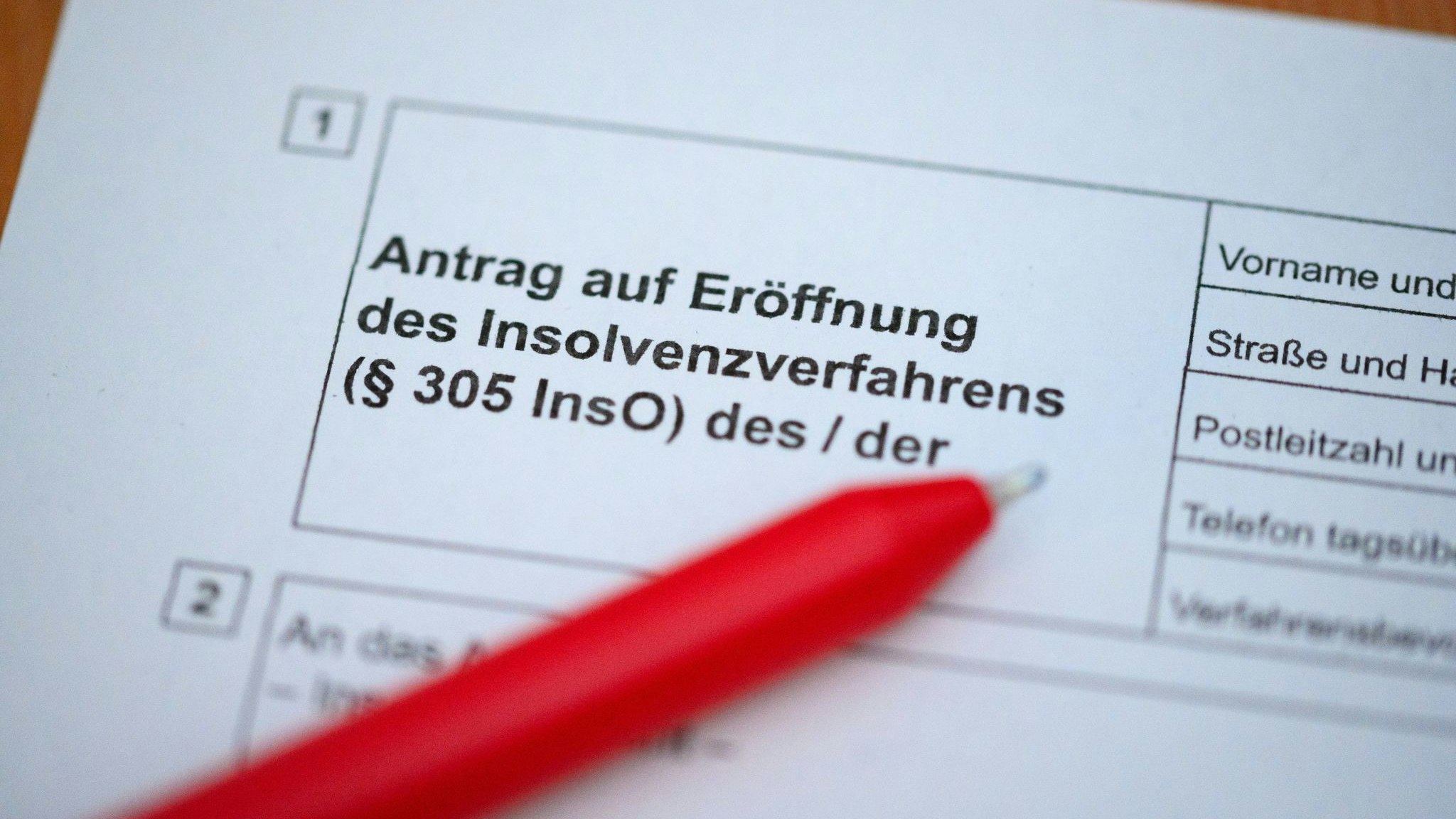 Immer mehr Firmen in Deutschland müssen laut Experten einen Antrag zur Eröffnung eines Insolvenzverfahrens ausfüllen. Foto: dpa/Walzberg